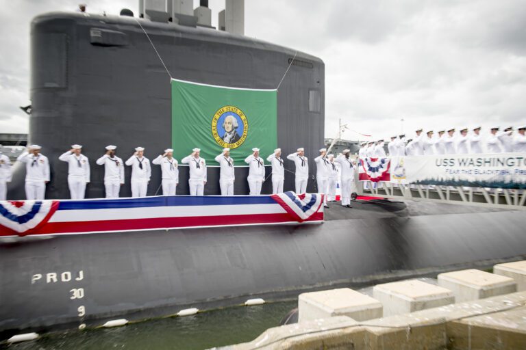 171007-N-NX690-587 
NORFOLK (Oct. 7, 2017) Sailors render a salute during the commissioning ceremony for the Virginia Class Submarine USS Washington (SSN 787) at Naval Station Norfolk.  Washington is the U.S. Navy's 14th Virginia-class attack submarine and the fourth U.S. Navy ship named for the State of Washington.  (U.S. Navy photo by Mass Communication Specialist 3rd Class Joshua M. Tolbert/Released)