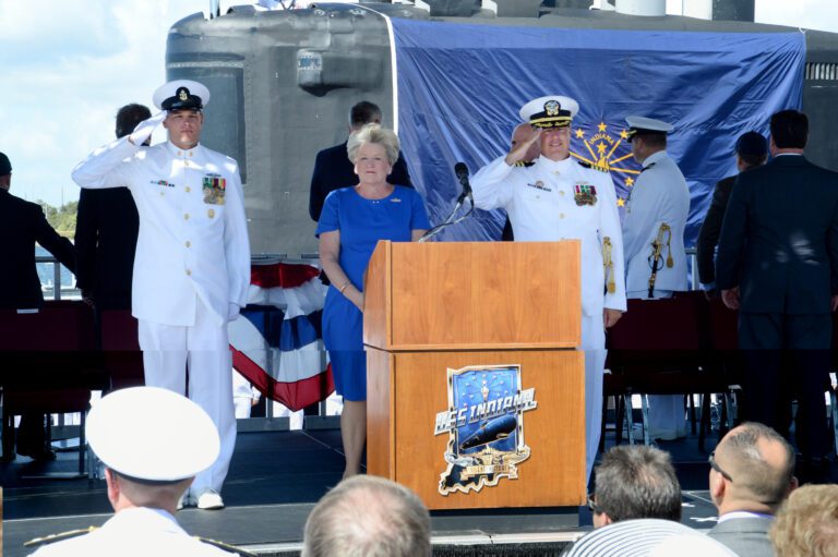 180929-N-JE719-0738
PORT CANAVERAL, Fla. (Sept. 29, 2018) USS Indiana's (SSN 789) chief of the boat, Senior Chief Charles Simonds; the submarine's sponsor, Diane Donald; and the commanding officer, Capt. Jesse Zimbauer, render honors during Indiana's commissioning ceremony. Indiana is the U.S. Navy’s 16th Virginia-class fast-attack submarine and the third ship named for the State of Indiana. (U.S. Navy photo by Mass Communication Specialist 1st Class Jeffrey M. Richardson/Released)