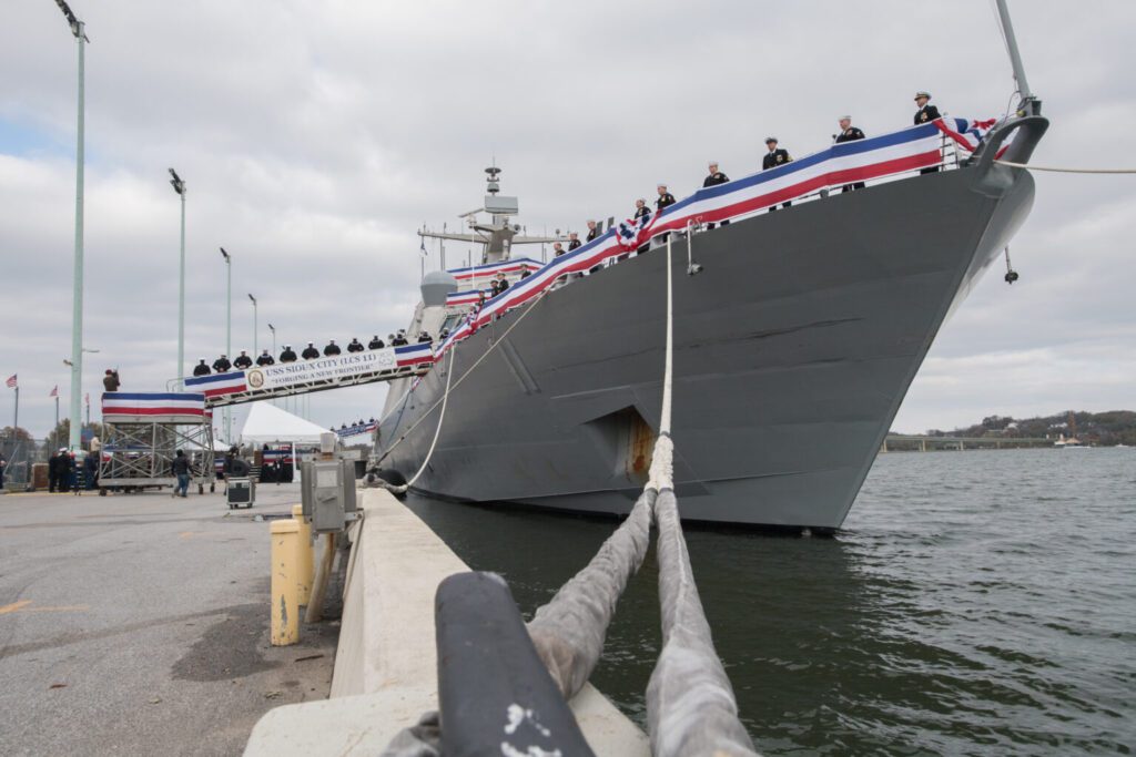 ANNAPOLIS, Md. (Nov. 17, 2018) The crew stand watch during the commissioning ceremony of USS Sioux City (LCS 11). Sioux City is the thirteenth littoral combat ship to enter the fleet and the sixth of the Freedom variant. It is the first ship named for Sioux City, the fourth-largest city in Iowa. (U.S. Navy photo by Kenneth D Aston Jr/Released)
