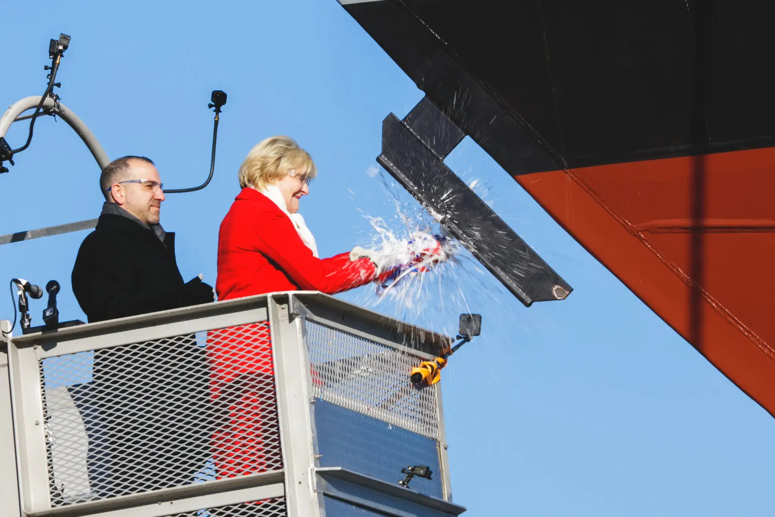 181215-N-N0101-197
MARINETTE, Wisc. (Dec. 15, 2018) Ship's sponsor Barbara Taylor christens the future littoral combat ship USS St. Louis (LCS-19) in Marinette, Wisconsin, Dec. 15, 2018. Once commissioned, LCS-19 will be the seventh ship to bear the name St. Louis. (U.S. Navy photo courtesy of Lockheed Martin/Released)