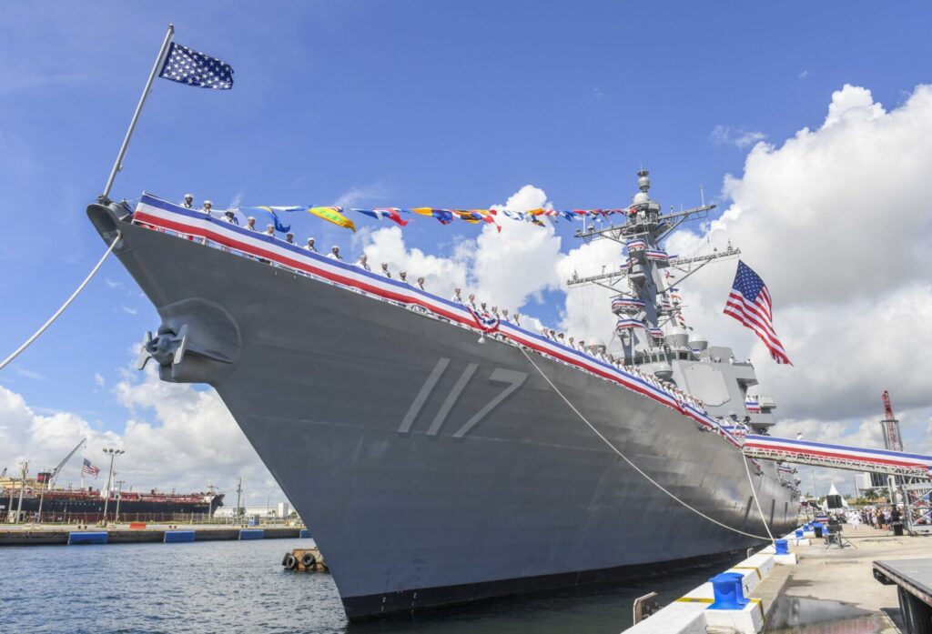 PORT EVERGLADES, Fla. (July 27, 2019) The crew of the Navy's newest Arleigh Burke-class guided-missile destroyer, USS Paul Ignatius (DDG 117), brings the ship to life during its commissioning ceremony. Paul Ignatius is the 67th Arleigh Burke-class destroyer and the first warship named for the former Secretary of the Navy who served under President Lyndon Johnson from 1967 to 1969. (U.S. Navy photo by Mass Communication Specialist 3rd Class Alana Langdon)