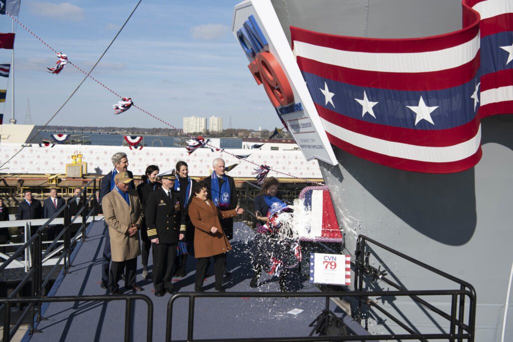 191207-N-ZI768-1505



NEWPORT NEWS, Va. (Dec. 7, 2019) - President John F. Kennedy’s daughter, the Honorable Caroline Bouvier Kennedy, former U.S. Ambassador to Japan and the ship’s sponsor, smashes a champagne bottle over the hull of the John F. Kennedy. On Dec. 7, 2019, the John F. Kennedy (CVN 79) was christened at Huntington Ingalls Industries' Newport News Shipbuilding (HII-NNS) division, in Newport News, Virginia. Kennedy is the second ship in the next-generation USS Gerald R. Ford (CVN 78)-class of nuclear-powered aircraft carriers and will be followed by the future USS Enterprise (CVN 80) and the future unnamed CVN-81. The aircraft carrier is named after John Fitzgerald Kennedy, the 35th president of the United States, who served in office from January 1961 to November 1963. This is the second U.S. aircraft carrier named for President Kennedy, with the former being the last conventionally powered carrier, CV-67, which served from 1968 to 2007. (U.S. Navy photo by Mass Communication Specialist Seaman Cory J. Daut)